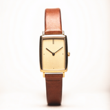 Vintage gouden horloge met rechthoekige kast